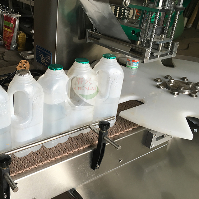 KIS-1800 Rotary Type Milk Bottle Sealing Machine